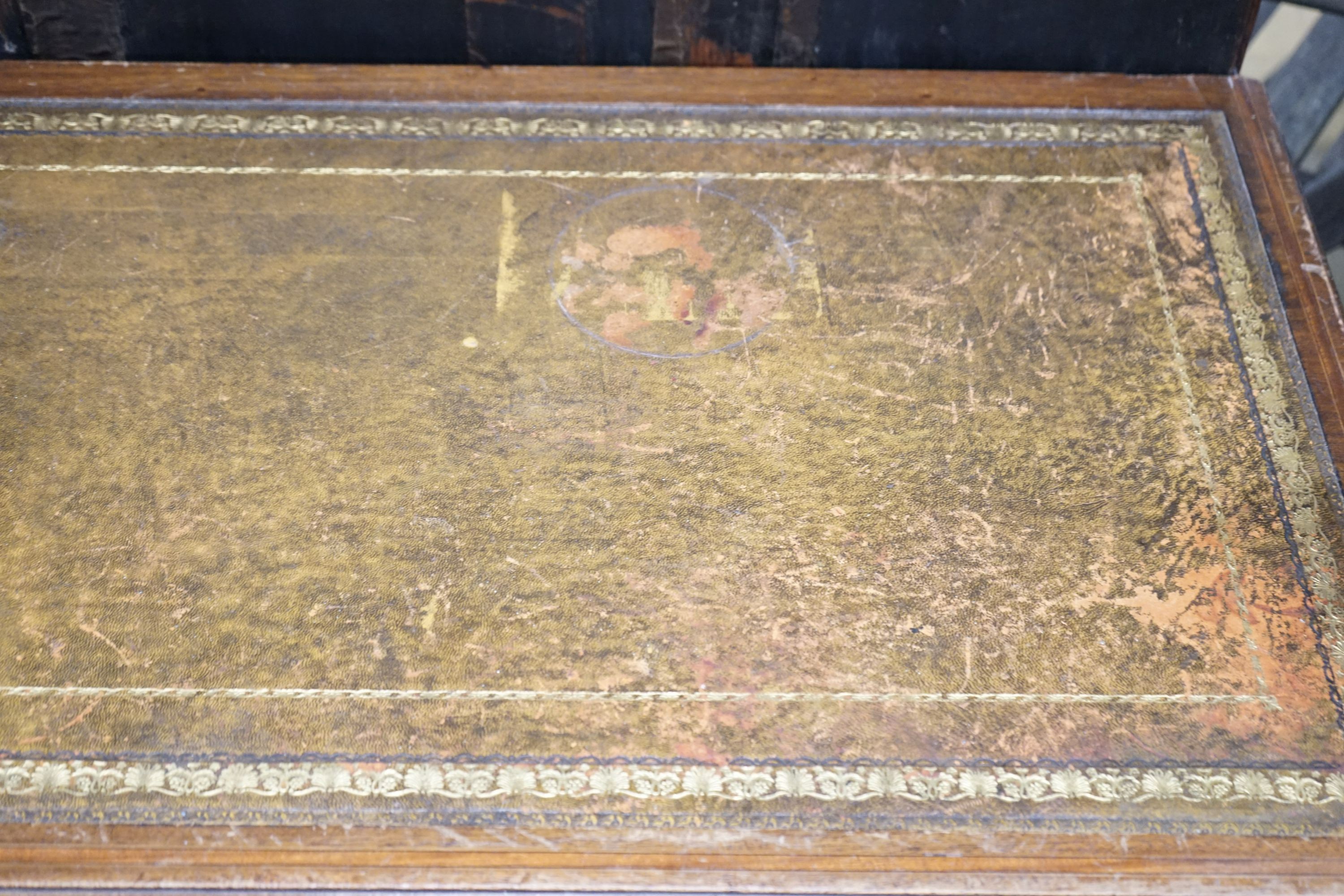 An Edwardian satinwood banded mahogany writing table, width 115cm, depth 53cm, height 72cm